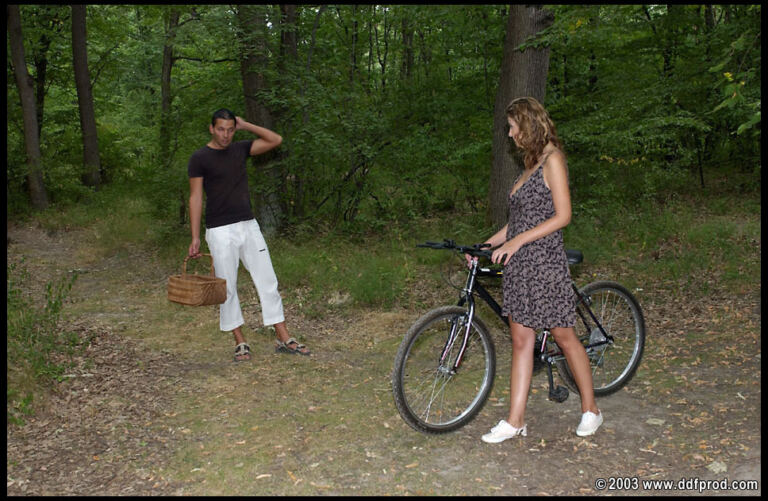 Judy White puts sensitive feet at the centre of an outdoor mature scene, with frequent close views of soles and toes. image 1