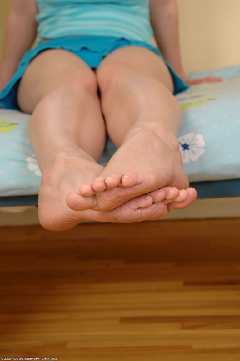 Natalie Nice keeps this blonde footjob set centred on her bare feet, ending with a direct feet close-up. image 3
