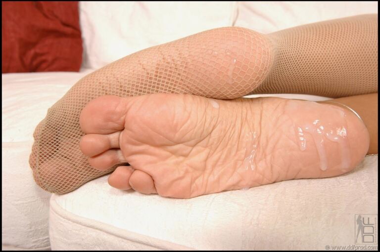 Francesca Felucci performs a barefoot footjob in an explicit mature scene, keeping her feet, legs, and partnered action plainly in view. image 21
