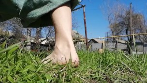 Walking barefoot on the grass and soil and show my dirty tiny feet -footfetish video